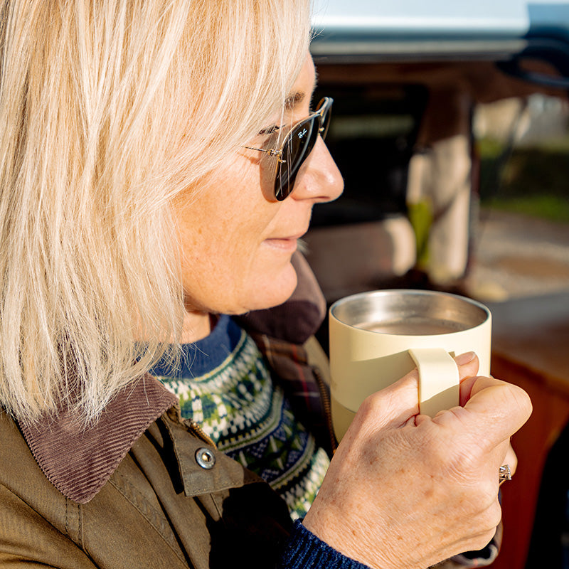 12oz-rise-mug-h8 12oz_rise_coffee_mug_wax_yellow_woman_drink_closeup_square.jpg