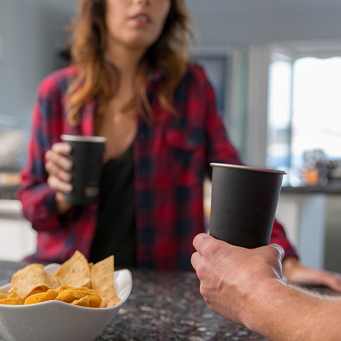 16oz-pint-cup-l7 16ounce_steel_pint_cup_black_party_lifestyle_e7c4b89f-bee2-44df-bb63-bc286febb421.jpg