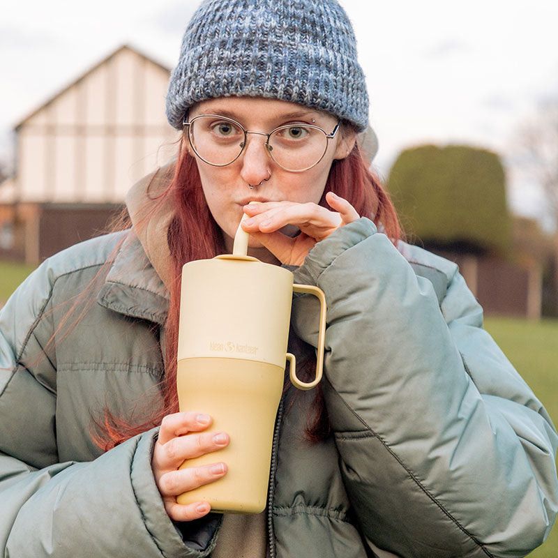 26oz-rise-tumbler-with-straw-lid-i9 26oz_rise_rumbler_straw_wax_yellow_woman_sip_square.jpg