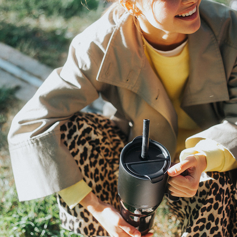 26oz-rise-tumbler-with-straw-lid-i9 26oz_rise_tumbler_black_woman_topview_square.jpg