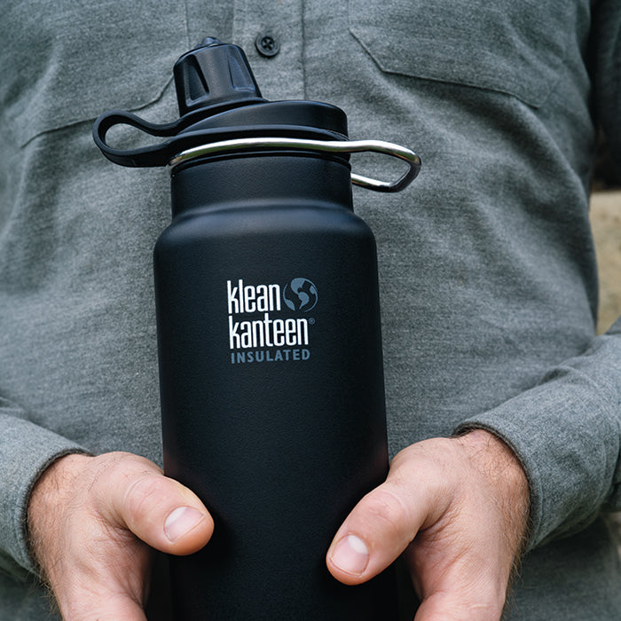 tkwide-chug-cap-g5 K32TKWSSL-SB-Craddled-Bottle_closeup_lifestyle.jpg