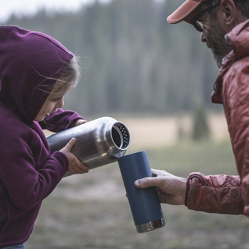 64oz-tkwide-with-loop-cap-g4 tkwide_64oz_bottle_girl_dad_filling_square.jpg
